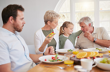 Image showing Big family home, children and together at breakfast, eating or talk for help, dad or grandparents at table. Men, women and kid for food, fruit or lunch for memory, conversation or chat in dining room