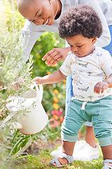 Image showing Mother, watering and child on plant with black family, love and support together with baby in garden. Lawn, green gardening and mom with happy kid, mama and backyard with youth and relax in nature