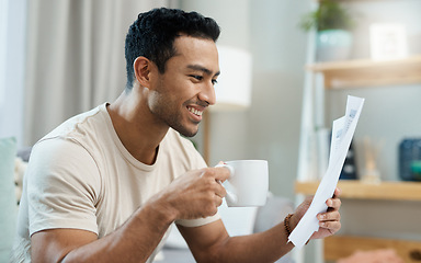 Image showing Home, bills and happy man with coffee for planning, reading financial documents and taxes management in living room. Young person with tea and paperwork for mortgage, budget and insurance or finance