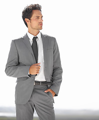 Image showing Business, suit and man outdoor thinking, stylish and confident on white background space. Travel, freedom and stylish male entrepreneur outside with positive attitude, idea or mindset for opportunity