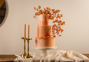 Image showing Peach color big wedding cake stand