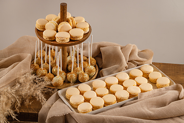 Image showing Macarons and pop cakes