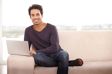 Image showing Man, work from home and portrait on laptop for stock market investment, planning and research on website and sofa. Startup freelancer or trader relax on a couch with his computer and trading software