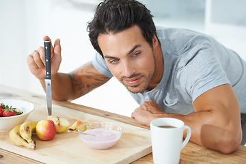 Image showing Man, fruit and thinking for morning breakfast diet or health nutrition, eating vitality or banana for protein. Male person, yogurt and apple detox meal for hungry vegan preparation, fiber or vitamins