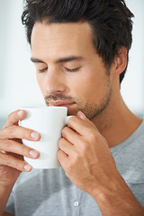 Image showing Man, coffee and cup smell for relax drink or morning breakfast beverage, calm daydream on lazy weekend. Male person, mug and caffeine latte for peace cappuccino aroma in home, quiet time for comfort