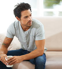 Image showing Tea cup, thinking and home man relax, planning or brainstorming ideas, decision or choice on living room sofa. Coffee break, morning drinks and person thoughtful over plan, problem solving or memory