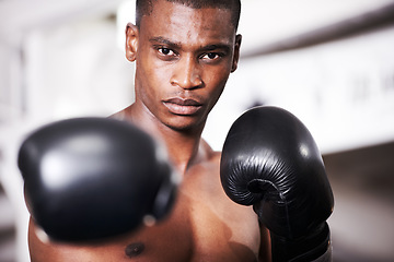 Image showing Boxing, gloves and punch, portrait of black man with fitness and power for training challenge. Strong body, muscle and hands of boxer in gym, athlete with fist up and confidence in competition fight.