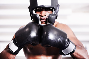 Image showing Boxing, gloves and headgear, portrait of black man in gym in fitness training, power and workout challenge. Strong body, fighting and boxer padded safety helmet, fearless and confident in competition