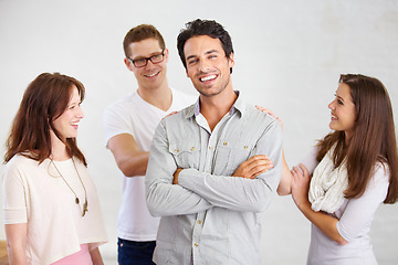 Image showing Team, portrait and happy business people with leader, arms crossed and confidence together in startup. Face, group and creative employees in collaboration, support and pride on a white background