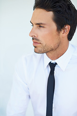 Image showing Face, thinking and a young business man in a shirt on a white background for professional employment. Idea, company and vision with a confident employee in a tie to work on his career or job