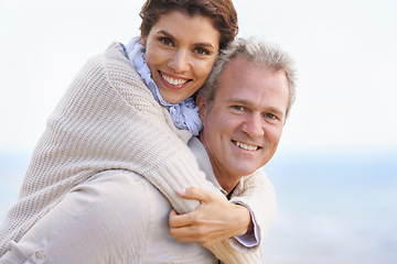 Image showing Mature couple, portrait and piggy back on vacation, airplane hands and happiness for holiday. Man, woman and bonding together with smile, marriage and commitment with affection, joyful and blue skies