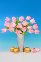 Image showing Gold Easter Eggs and Spring Tulip Flower Bouquet