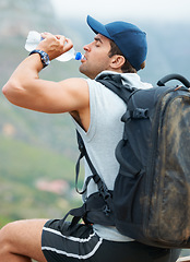 Image showing Man, hiking and drinking water in nature rest for fitness, exercise and workout in Brazil mountains. Hiker, athlete and person with liquid bottle for summer sports break, electrolytes and wellness