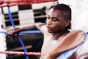 Image showing Man, boxing ring and sweat or tired in gym for fitness exercise, professional athlete and rest. Black person, exhausted and competition punch practice or goals training, mma fight in arena battle
