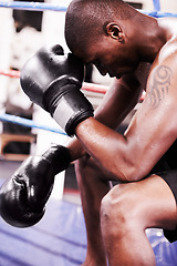 Image showing Man, boxer and face down in boxing ring, sweat and gloves for workout, fighter and strong. Exercise, sports and train for power, self defense and concentration for challenge, mma and fighting skills