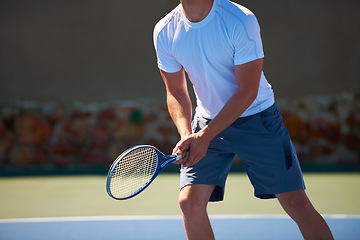 Image showing Man, racket and ready for tennis match, athlete and sports on court, turf and fitness. Male person, cardio and exercise or practice in outdoors, training and active for competition, skill and game