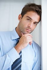 Image showing Thinking, wall and portrait of business man in office with confidence, pride and ambition. Corporate, professional and face of entrepreneur with ideas for company, career and job in workplace