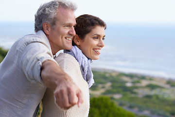 Image showing Mature couple, happy and outdoor on vacation, airplane hands and weekend for enjoying holiday. Man, woman and bonding together with smile, marriage and commitment with affection, seaside and joyful