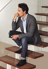 Image showing Thinking, anxiety and business man waiting on stairs of office building with stress, fear or worry. Hiring, human resources or nervous applicant overthinking on steps for recruitment opportunity