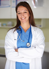 Image showing Happy woman, portrait and veterinarian professional doctor at clinic for animal care, shelter or healthcare service. Female person, nurse or pet surgeon smile with arms crossed in confidence at vet