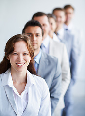 Image showing Woman, portrait and happy for office, row and ready for leader selection process. Workers, corporate accountant in suit and professional in workplace, confident employees and accounting group