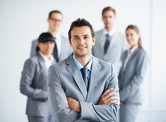 Image showing Team leader happiness, arms crossed and business portrait man, lawyer or advocate legal pride, confidence or career experience. Group trust, boss and attorney happy for corporate community management