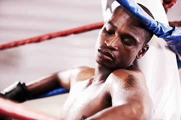 Image showing Man, boxing ring and workout rest or exercise sweat, professional athlete or tired burnout. Black person, exhausted and competition punch practice or goals training, mma fight fatigue in arena battle