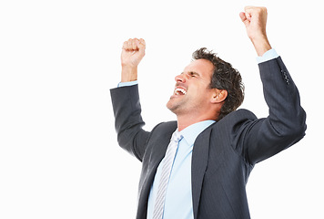 Image showing Business man, winner and success in studio for celebration, achievement or winning of bonus, sales or profit. Excited corporate worker with fist, yes and shouting or opportunity on a white background