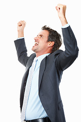 Image showing Business man, winner and yes in studio for celebration, achievement or winning of bonus, sales or profit. Excited corporate worker with fist, success and freedom for opportunity on a white background