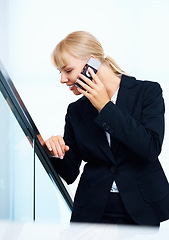 Image showing Business, smile and phone call with woman, connection and communication with network, speaking and digital app. Professional, employee or consultant with a cellphone, mobile user and calling with joy