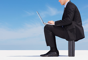 Image showing Laptop, hands typing and business man on briefcase on blue sky mockup space. Serious professional consultant writing email on computer, working on research and communication on internet or website