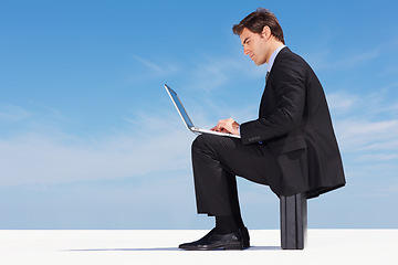 Image showing Laptop, typing and business man on blue sky mockup space, clouds and briefcase. Serious professional consultant writing email on computer, working on research and communication on internet or website