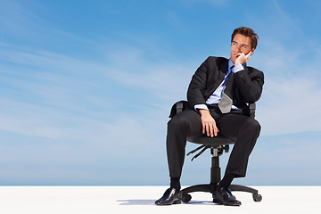 Image showing Sky, space and a business man thinking on a chair for planning with vision for the future of his company. Corporate, idea and mockup with a young employee in a suit on a cloudy blue background