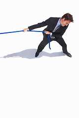 Image showing Top view, businessman or pulling rope by white background with career challenge in competition. Young person, frustrated and professional worker in suit with job battle and tug of war in workplace