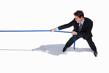 Image showing Businessman, conflict and tug of war by white background, career challenge and workplace competition. Young person, mental health and professional worker with rope, top view and job battle in studio