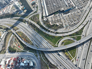 Image showing Aerial View Modern Multilevel Motorway Junction with Toll Highway, Road traffic an important infrastructure Transportation and travel concept