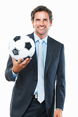 Image showing Businessman, portrait and happy with football in studio for soccer, marketing or sport advertisement. Mature, entrepreneur or face and smile with ball, confidence and pride on white background