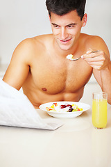 Image showing Happy, eating and young man with fruit salad at his home for healthy breakfast or snack. Smile, wellness and male person from Canada enjoying yoghurt for meal in the kitchen at his modern apartment.