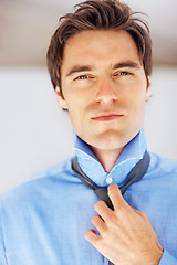 Image showing Business, tie and portrait of man dressing in home for morning routine, change and ready. Fashion, professional and career with face of person and shirt for confidence, start and preparation