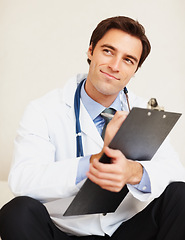 Image showing Clipboard, thinking doctor and happy man writing medical report plan, hospital information or medicine notes. Brainstorming cardiology ideas, checklist and expert planning clinic healthcare paperwork