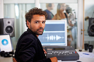 Image showing DJ, musician and recording studio portrait with a man and music producer with tech and computer. Sound engineer, audio technician and media editor with professional in booth with synthesizer control