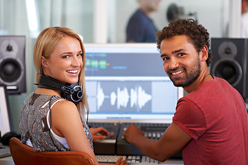 Image showing Man, woman and audio engineer with computer, portrait and headphones in recording studio for music. Musician, artist and producer with sound tech for wave analysis, smile and mixer with creativity