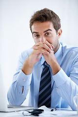 Image showing Laptop, office and portrait of business man at desk with confidence, pride and ambition. Corporate, professional employee and face of entrepreneur with ideas for online project, documents and report