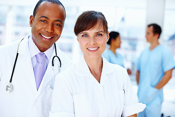 Image showing Portrait, collaboration or doctor with healthcare, nurse or medicine with trust, about us or medicare. Face, people or group with medical, professional or smile in a hospital, cooperation or wellness