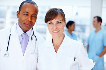 Image showing Portrait, teamwork and doctor with wellness, nurse and career with leadership, clinic and medicare. Face, people and group with medical, professional and uniform in a hospital, smile and healthcare