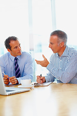 Image showing Business men, documents and writing in meeting for advice, support and investment, partnership or contract negotiation. Clients, mature advisor or people talking of financial benefits with checklist