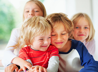 Image showing Family, brothers or sisters for hug together for love, relax wellness and happiness with sibling support in home. Boys, girl and smile face for fun games in happy, bonding or care in morning in house