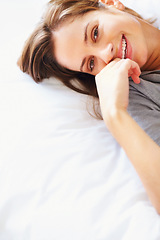 Image showing Relax, blanket and portrait of happy woman on bed for sleeping, dreaming and comfortable. Smile, home and face of person in bedroom resting, nap and wake up for health, wellness and calm in morning