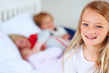 Image showing Child portrait, smile and family on bed with love together, hug and bonding with relax wellness in home. Girl, face and happiness in morning for support, care and peace with positive kid in apartment