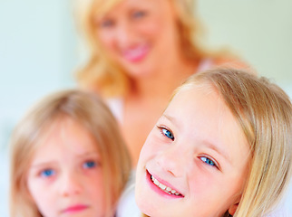 Image showing Happy, smile and mother with kids for bonding, relaxing and spending time together at home. Excited, love and young mom chilling and resting with girl children from Australia in bedroom of house.